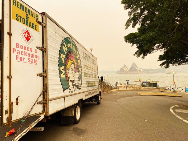 Our removalist truck parked at Kirribilli (note the bushfire smoke blanketing Sydney Harbour and obstructing the view of the Opera House)