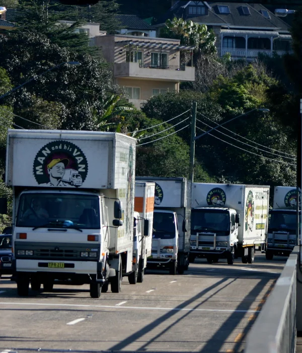 Man and His Van commercial removalist fleet on the road in Sydney for an office relocation.