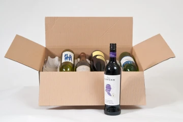 Man and His Van professional packing service and secure shipping box.