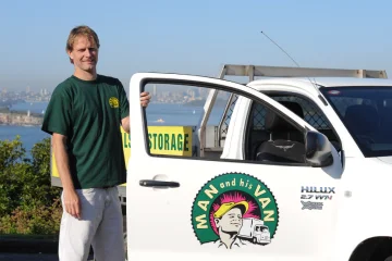 A punctual and professional Man and His Van removalist ready at his ute, providing efficient furniture removalist services across Sydney.