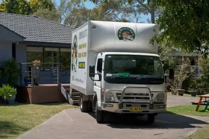 Man and His Van professional movers parked at a Northern Beaches Sydney property, providing local home removal services.