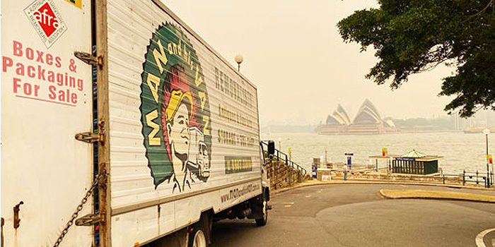 Man and His Van removalist truck overlooking Sydney Harbour and the Opera House